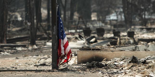 incendies-aux-etats-unis-:-le-nord-ouest-du-pays-confronte-a-une-saison-des-feux-exceptionnelle;-la-ville-de-spokane-ressemble-a-une-zone-de-guerre